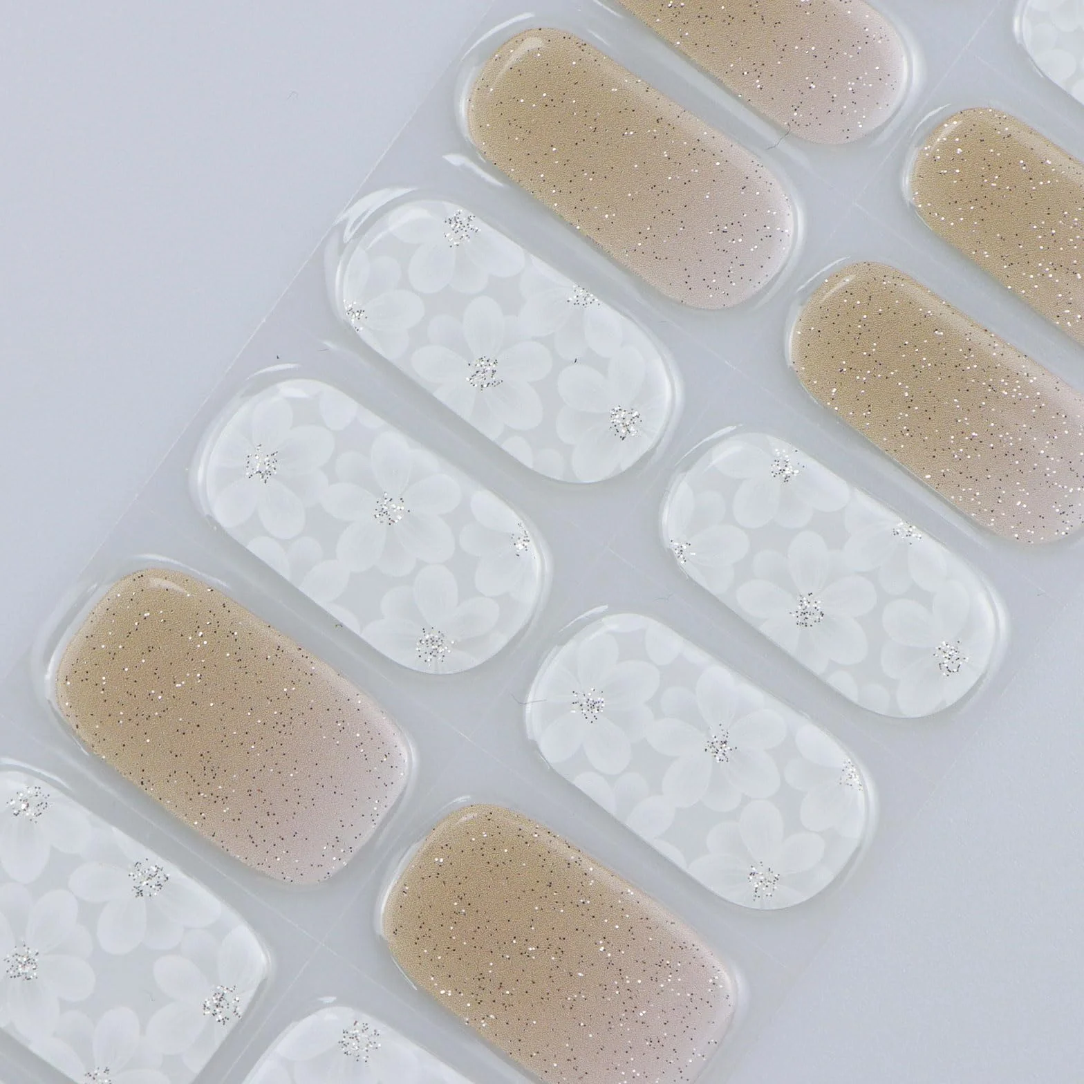 Autocollants pour ongles UV/LED motifs fleurs blanches pailletées semi-durci